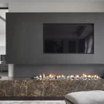 The 2000TS Stone fireplace is an open fronted gas fire with a long linear flame from three viewing angles