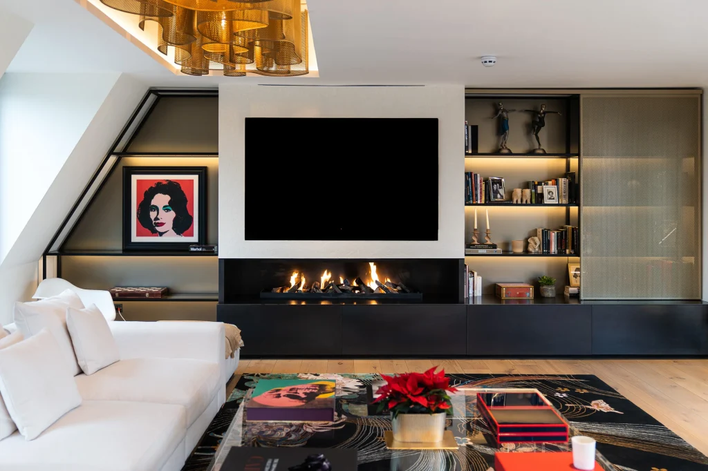 open gas fire TV installed above. Fire and tv combination