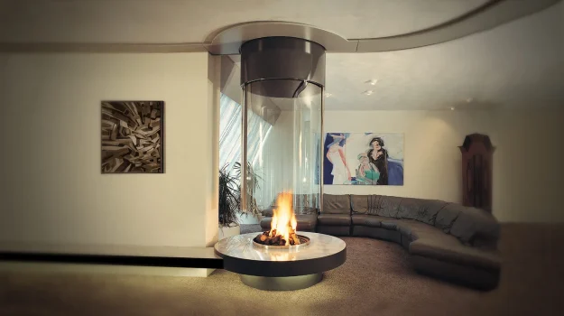 wide shot of the 186 original hanging fireplace in front of sofa