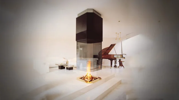 77 special hanging fireplace that is hexagonal in shape and installed in the centre of a large open space
