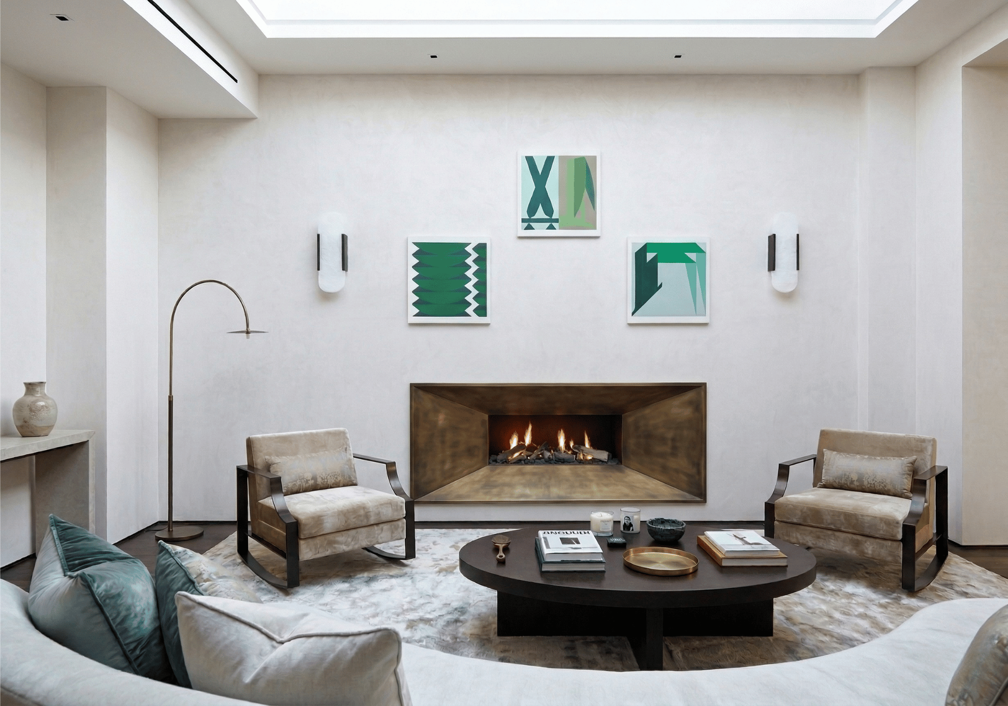 Bespoke gas fireplace with chamfered brushed bronze steel surround and log fuel bed in a contemporary plastered living room by Modus Fireplaces